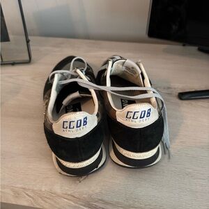 Golden Goose Black and White Sneakers with Blue Accents